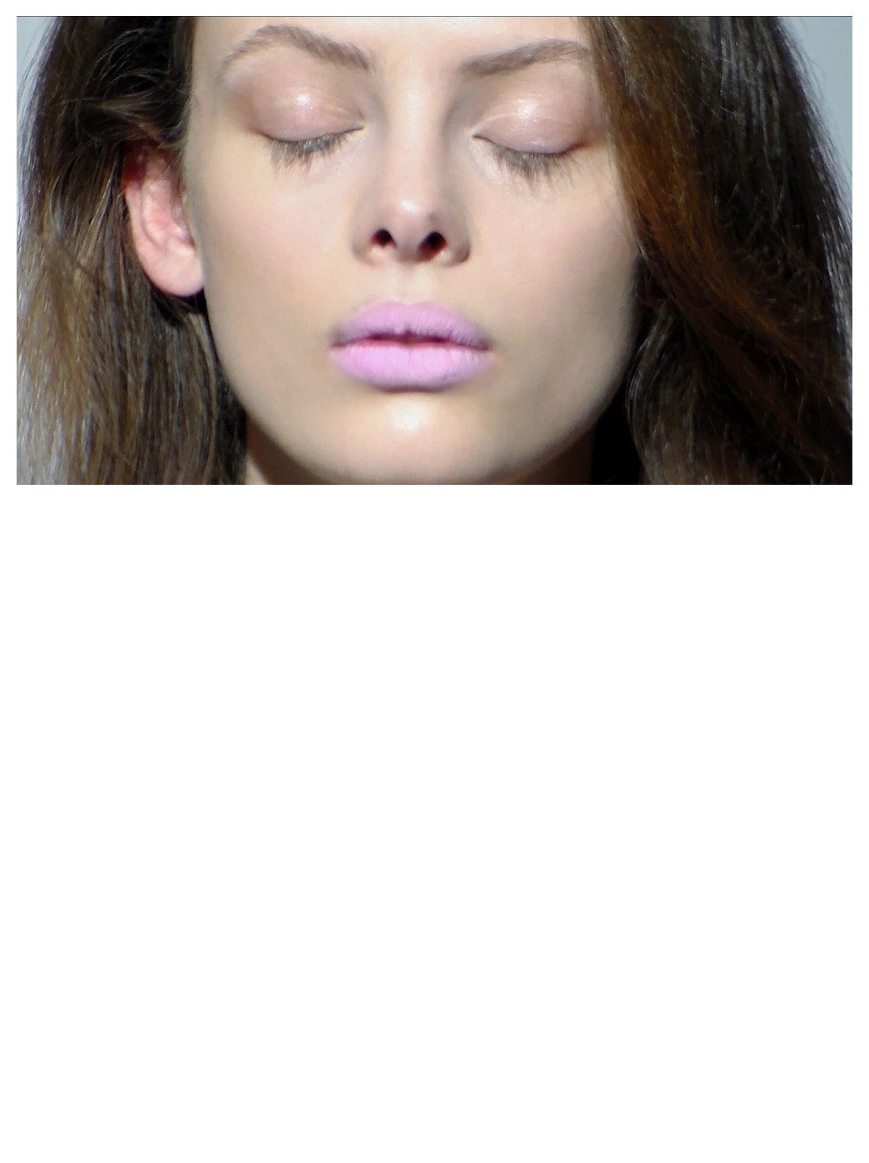 Beauty close-up of a model with lilac lips, eyes open and closed